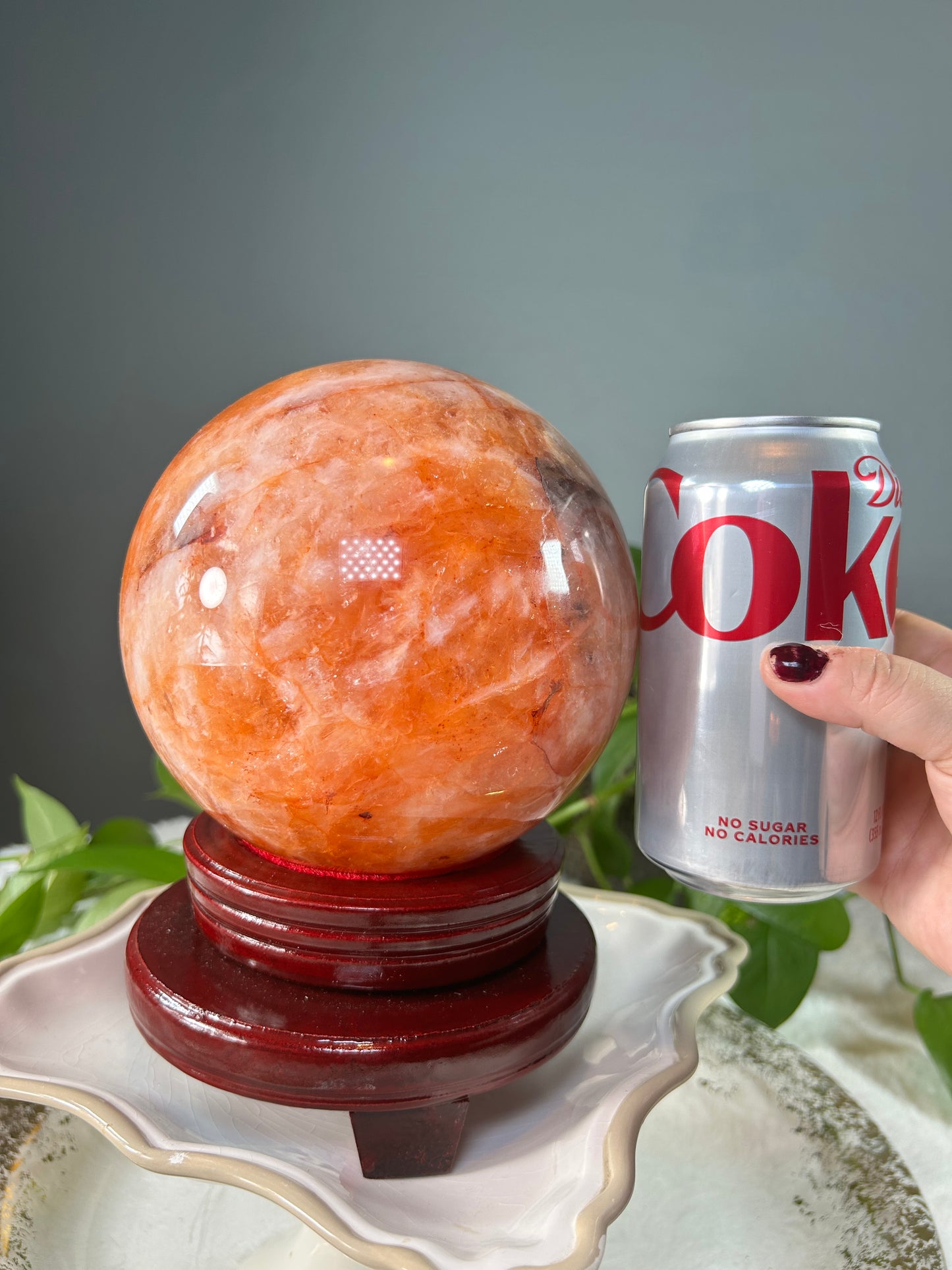 X-Large orange colored fire quartz sphere with red hematoid inclusions- 11.085 pounds (6in wide)