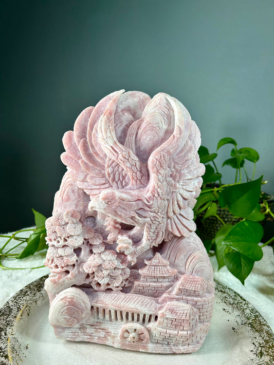 XX-Large pink opal eagle over village hand carved carving statue - 15.805 pounds (9in x 14in x 2.5in)